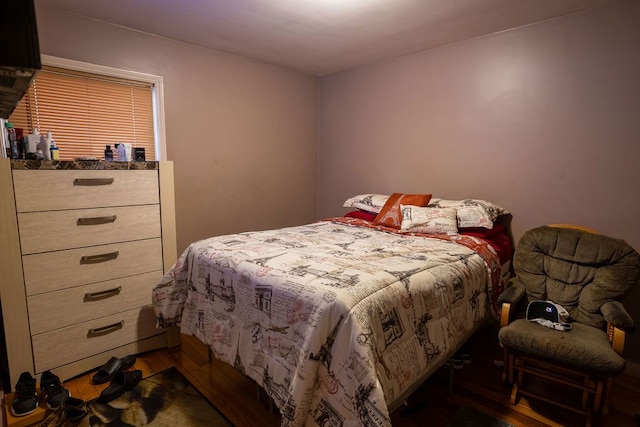 bedroom featuring dark hardwood / wood-style floors