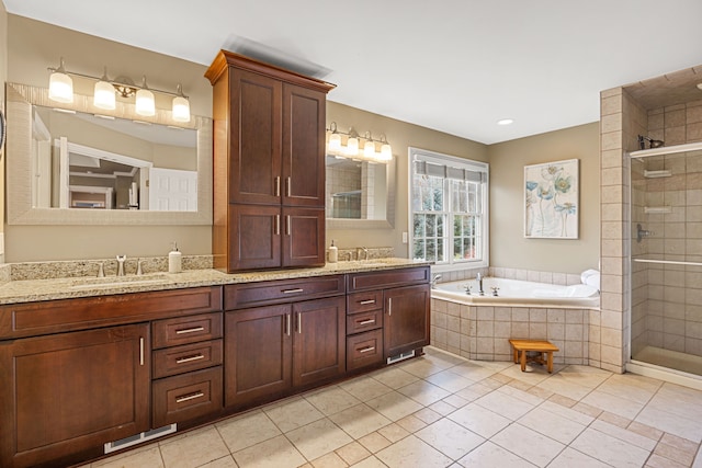 bathroom featuring tile patterned flooring, vanity, and independent shower and bath