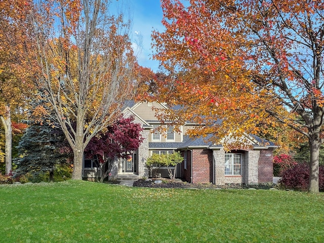 view of front of home featuring a front lawn