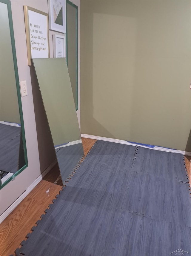 interior space with dark wood-type flooring