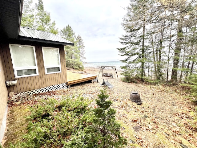 view of yard featuring a wooden deck