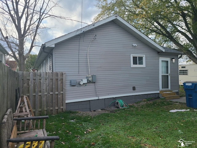 view of property exterior featuring a yard