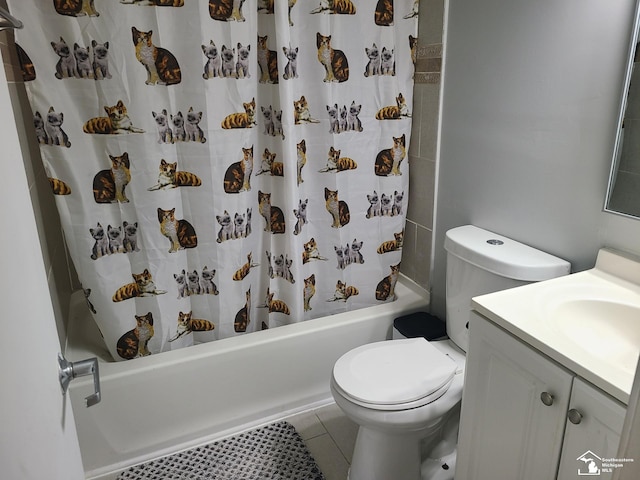 full bathroom featuring tile patterned flooring, vanity, shower / bath combo, and toilet