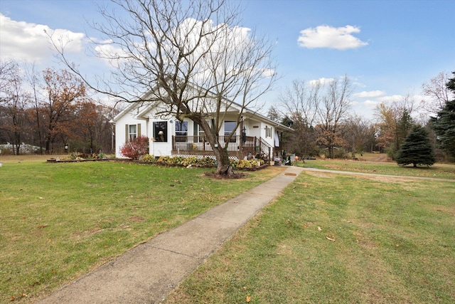 view of front of home featuring a front lawn and a porch