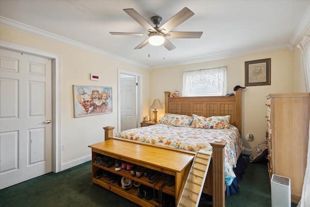 carpeted bedroom with ceiling fan and crown molding