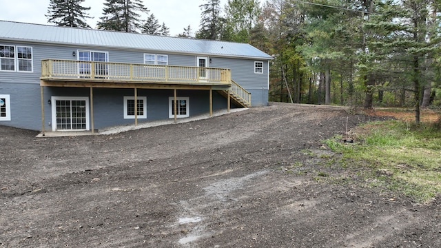 rear view of house with a deck