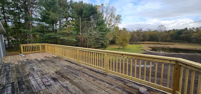 deck featuring a water view