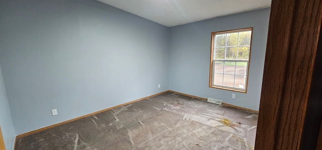 view of carpeted spare room