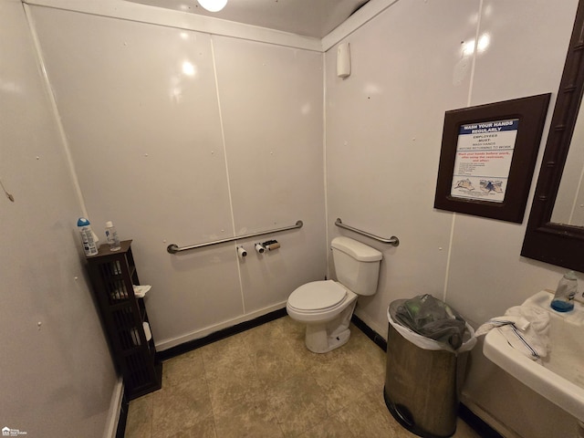 bathroom featuring toilet