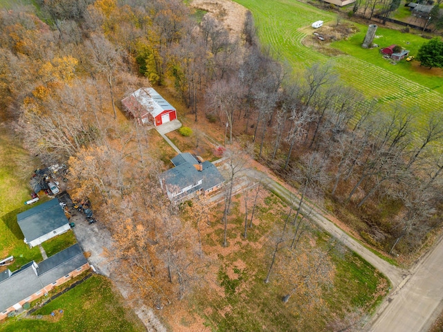 birds eye view of property with a rural view