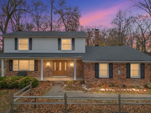 view of property featuring a porch