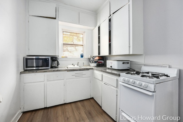 kitchen with white cabinetry, dark wood-type flooring, and white range with gas stovetop