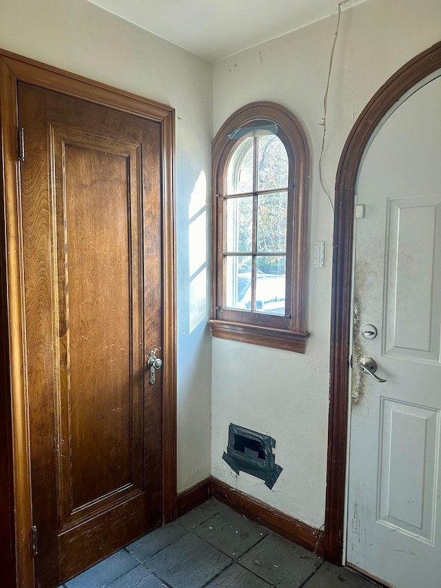 entrance foyer featuring light tile patterned floors