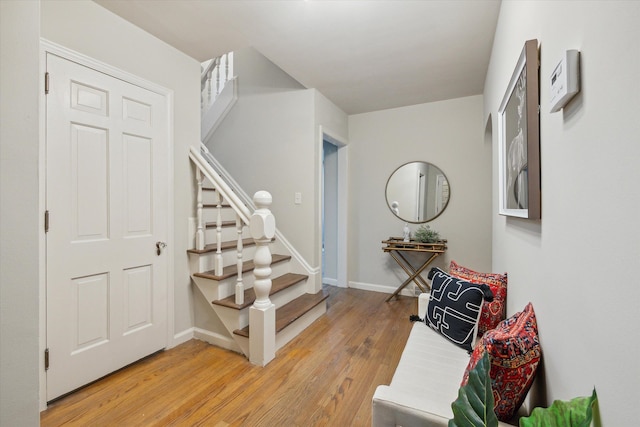 foyer with light hardwood / wood-style flooring