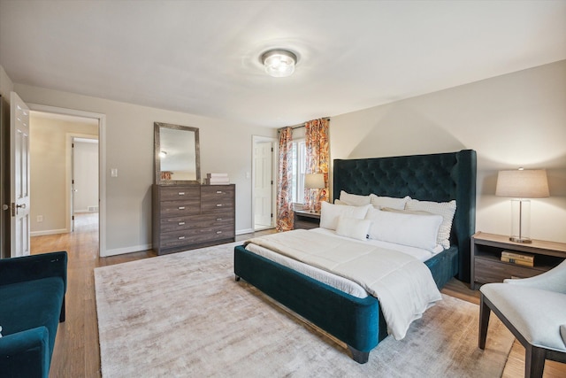 bedroom featuring light hardwood / wood-style flooring