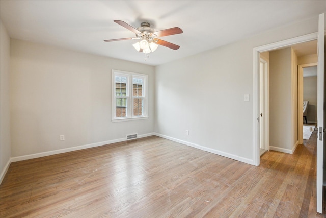 spare room with ceiling fan and light hardwood / wood-style flooring