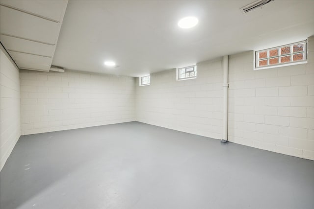 basement featuring plenty of natural light