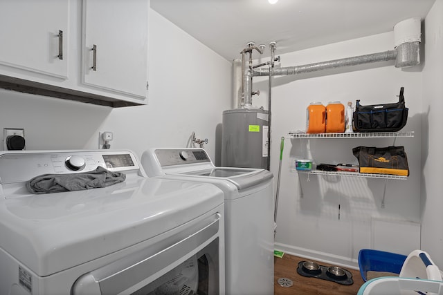 laundry room with cabinets, independent washer and dryer, hardwood / wood-style flooring, and water heater