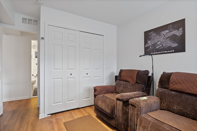 living area featuring light hardwood / wood-style floors