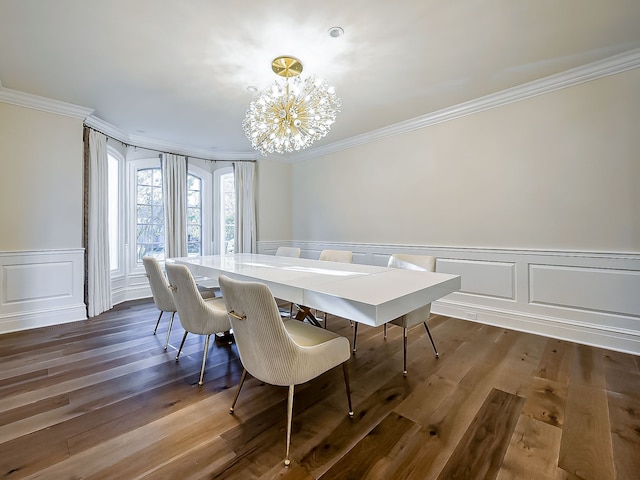 dining area with a chandelier, dark hardwood / wood-style flooring, and crown molding