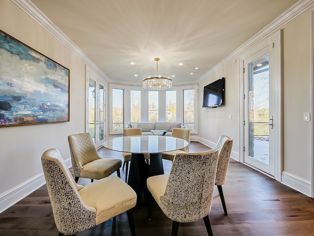 dining area with a chandelier, dark hardwood / wood-style flooring, and ornamental molding