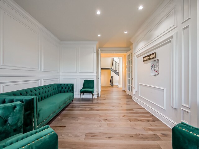 2748 Turtle Lake Dr, Bloomfield Hills, MI 48302 - sitting room with light wood-style floors, recessed lighting, baseboards, and stairs