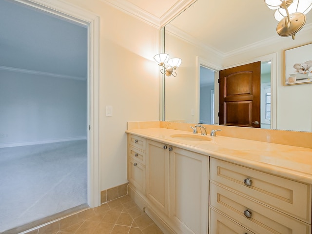 bathroom with vanity, tile patterned floors, and crown molding