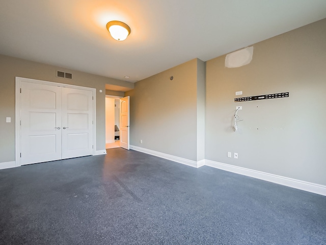 unfurnished bedroom with a closet