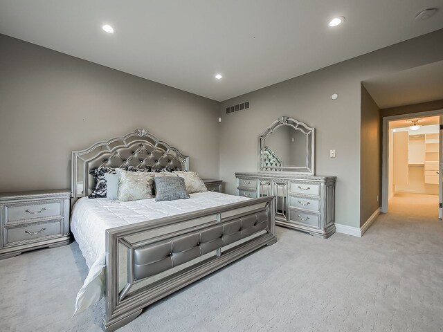 2748 Turtle Lake Dr, Bloomfield Hills, MI 48302 - bedroom with light colored carpet, recessed lighting, and baseboards