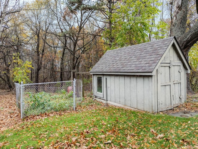 view of outdoor structure with a lawn