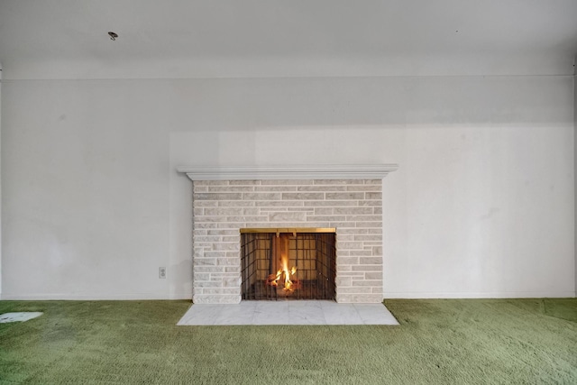 interior details featuring a fireplace and carpet floors