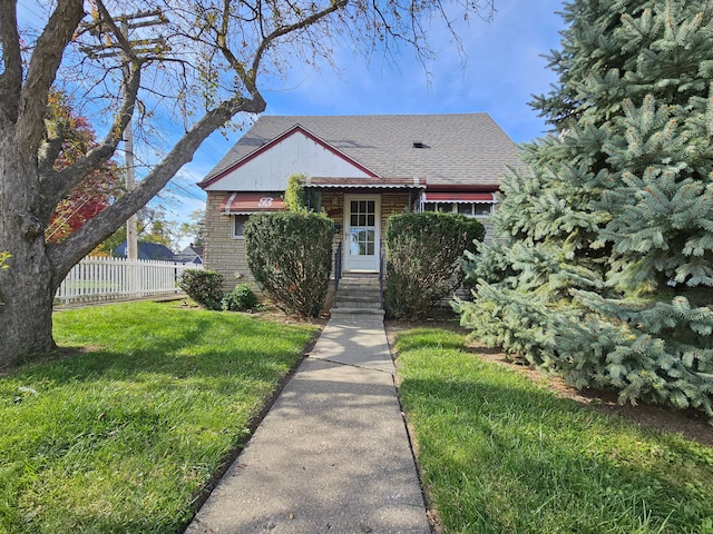 view of front of house with a front lawn