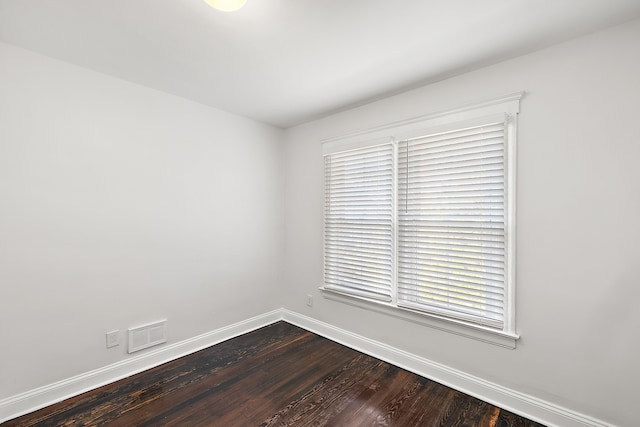 unfurnished room featuring wood-type flooring