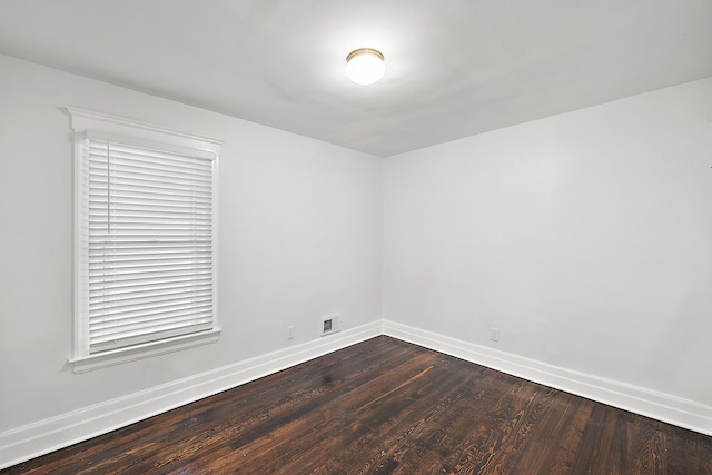 unfurnished room featuring wood-type flooring