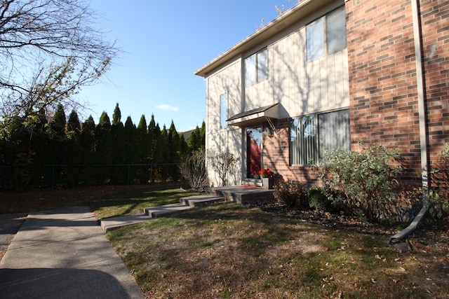 exterior space with a lawn