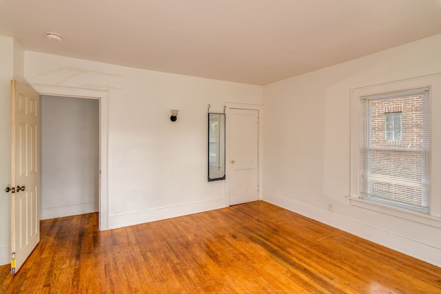 spare room featuring dark hardwood / wood-style floors