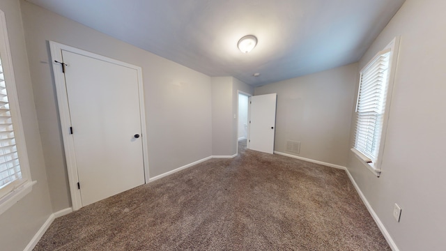 empty room with carpet floors