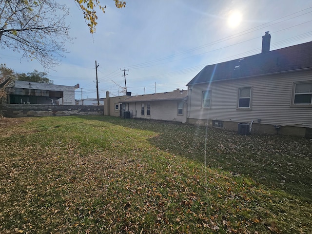 view of yard featuring central air condition unit