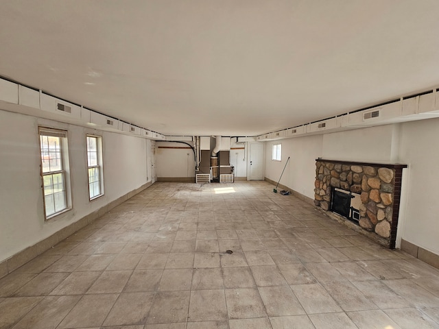 basement featuring a fireplace