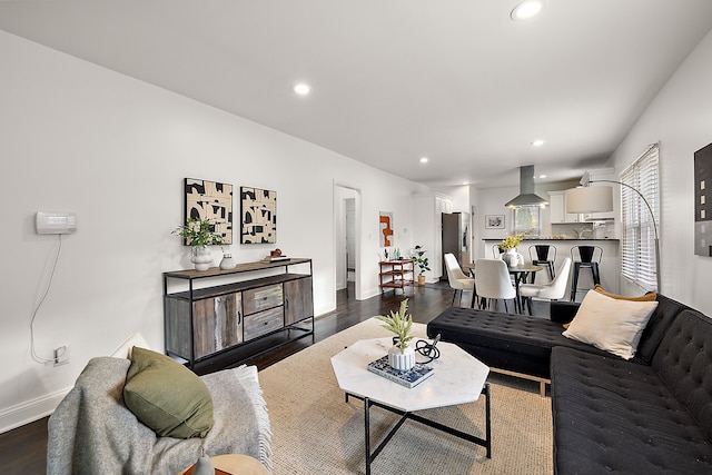 living room featuring dark hardwood / wood-style floors