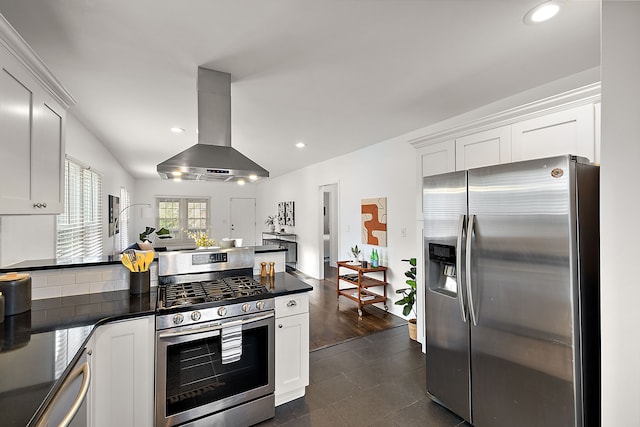 2552 Beals St, Detroit, MI 48214 - kitchen with stainless steel appliances, range hood, dark countertops, white cabinets, and recessed lighting