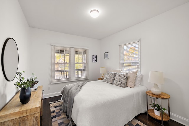 2552 Beals St, Detroit, MI 48214 - bedroom with dark wood-style flooring and baseboards