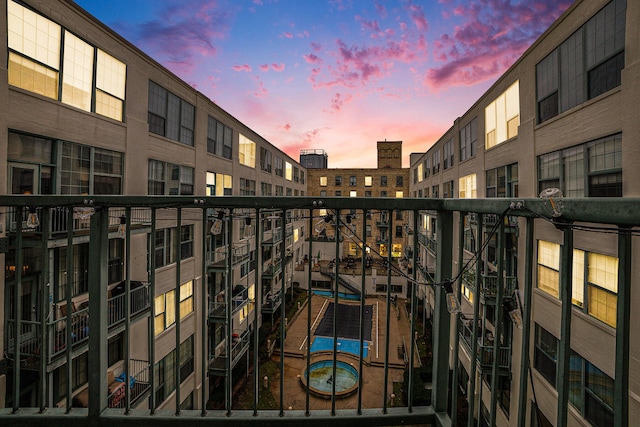 view of balcony at dusk