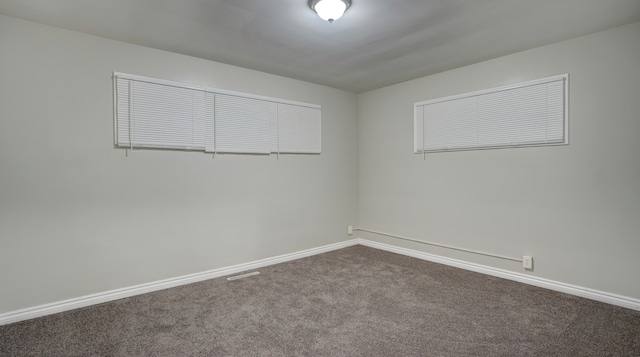 empty room featuring carpet flooring