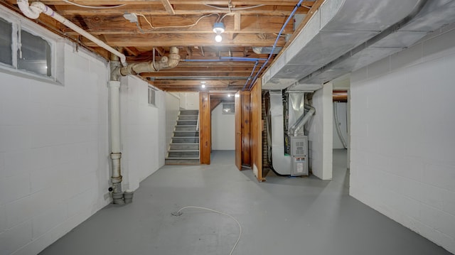 basement featuring heating unit