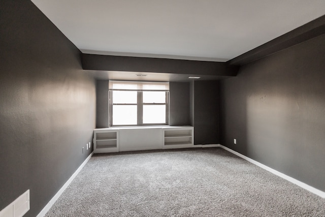 empty room featuring carpet floors