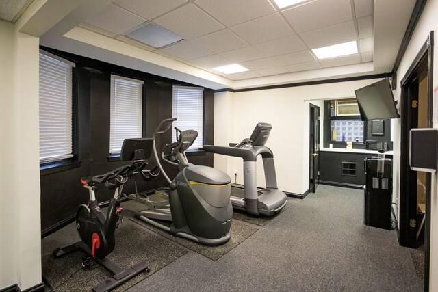 2900 E Jefferson Ave # A2, Detroit, MI 48207 - workout area featuring a paneled ceiling and baseboards