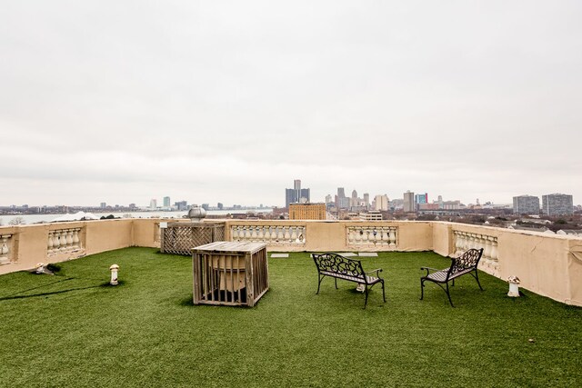 2900 E Jefferson Ave # A2, Detroit, MI 48207 - view of grassy yard with a view of skyline
