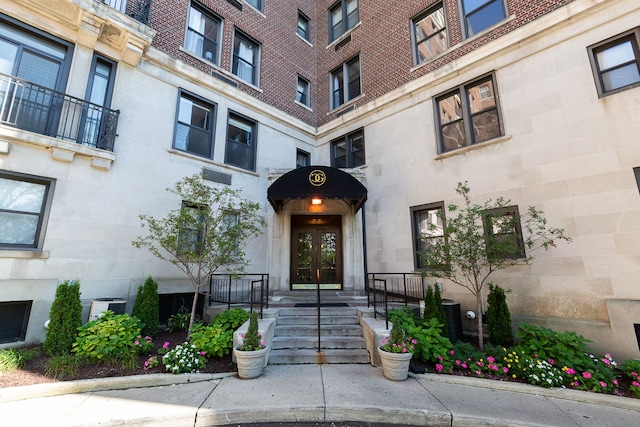 property entrance featuring french doors