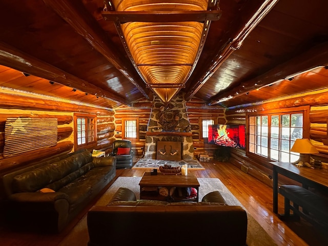 living room featuring wood-type flooring, lofted ceiling with beams, rustic walls, and wood ceiling